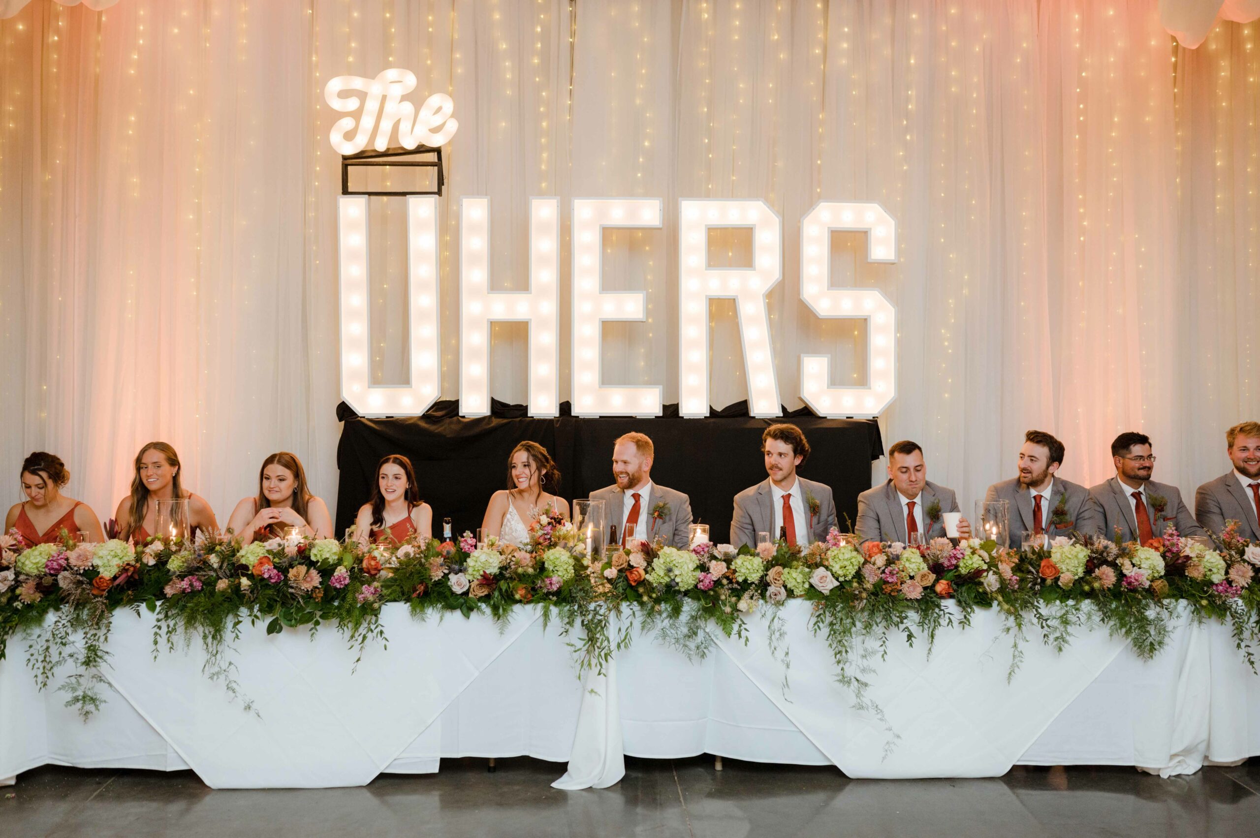 Uhers sign shown off at Omaha Palazzo wedding in late winter