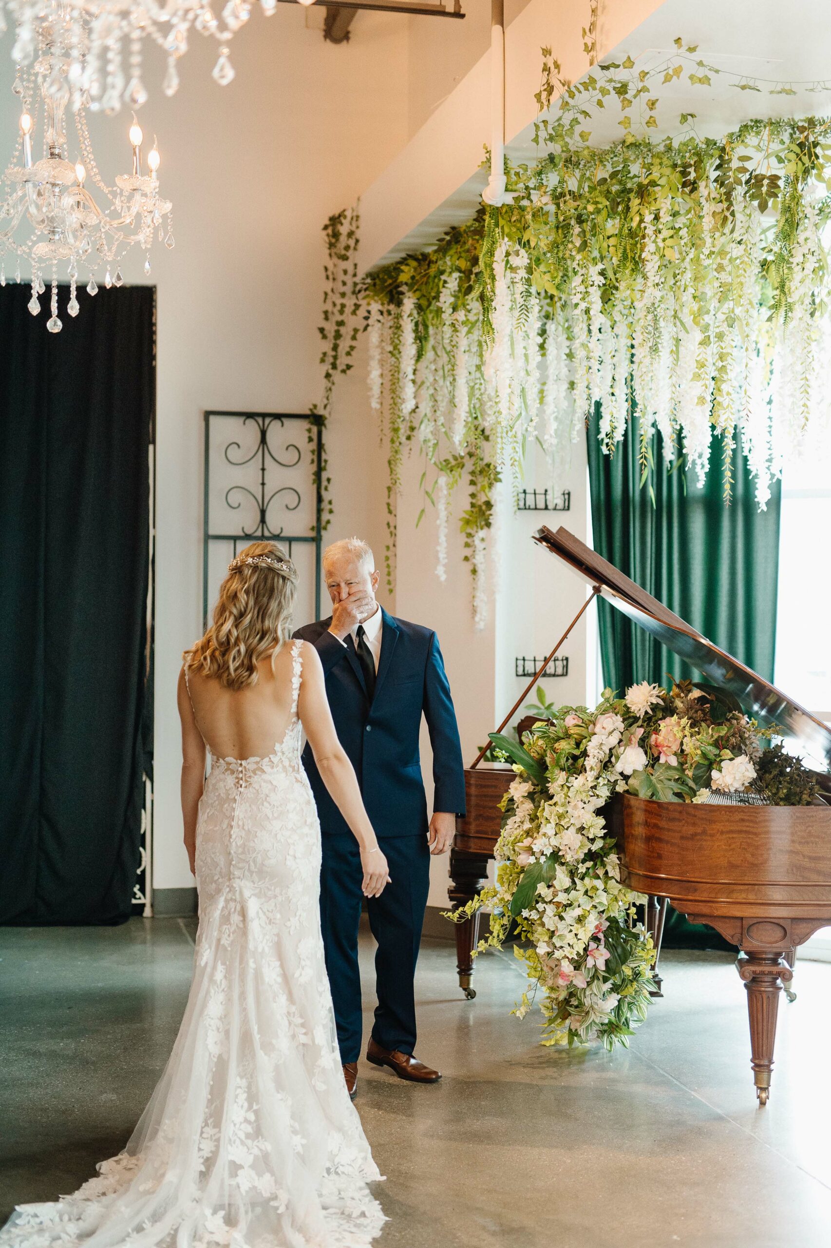 Bride and father first look in front of The Garden Room's grand piano